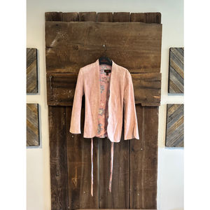 Women’s pink leather jacket by Danier leather. With floral print. Petite 0-2